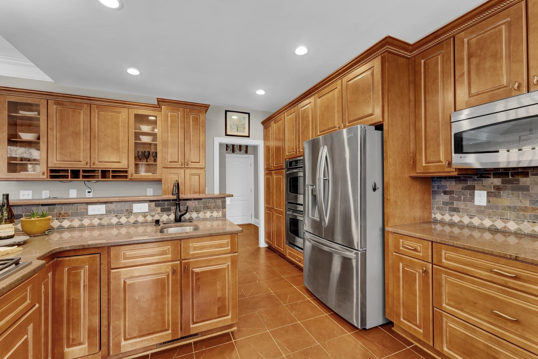 118 Citation Circle Durham, NC 27704 - Photo 12 of 67 a kitchen with stainless steel appliances granite countertop a refrigerator stove and sink