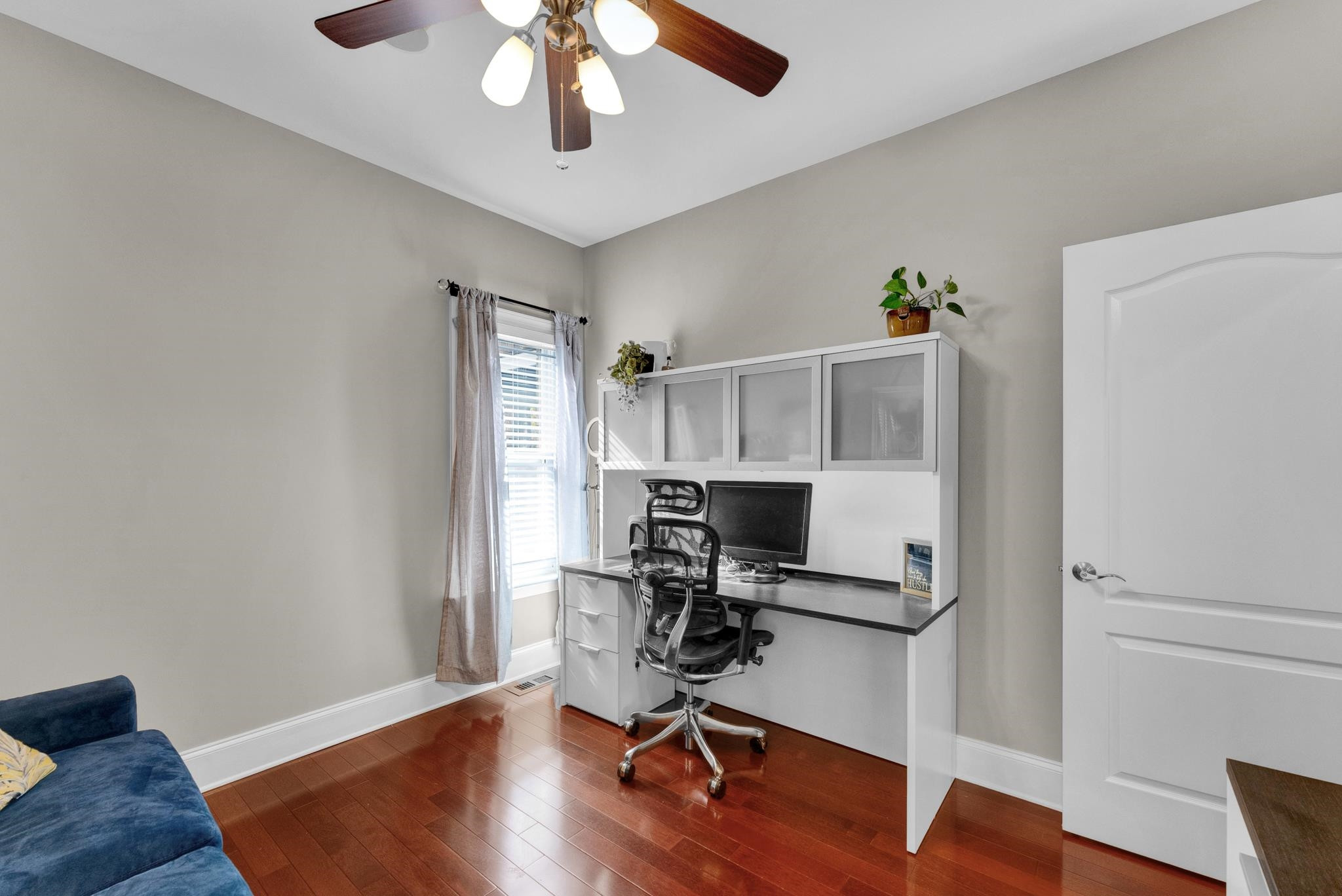118 Citation Circle Durham, NC 27704 - Photo 30 of 67 a view of a workspace with furniture and wooden floor