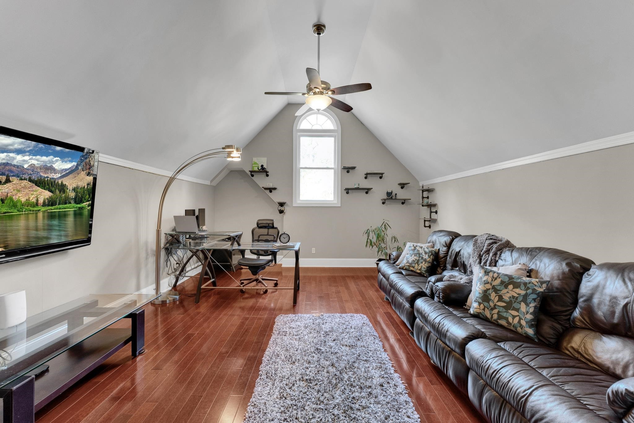 118 Citation Circle Durham, NC 27704 - Photo 31 of 67 a living room with furniture and a flat screen tv