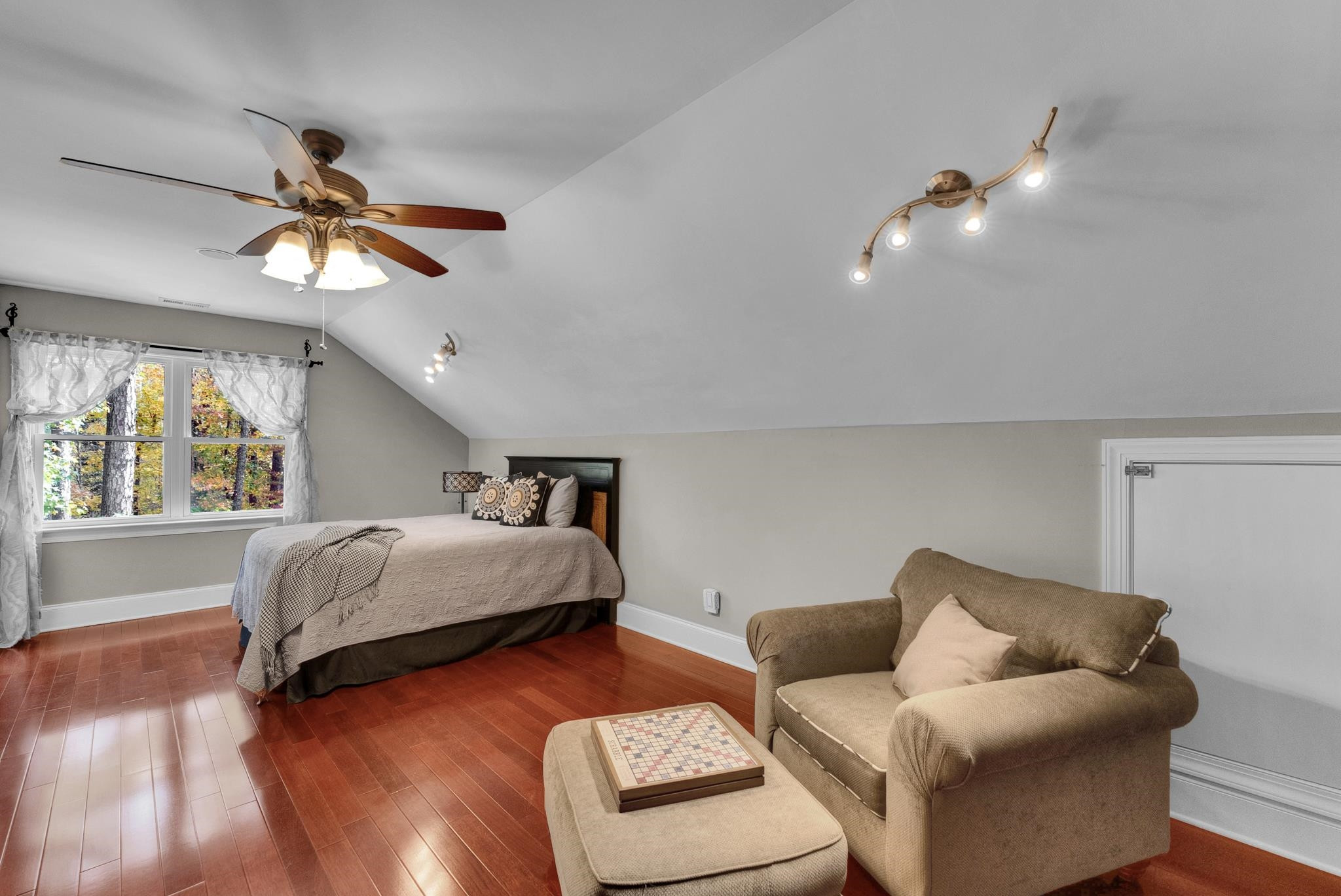 118 Citation Circle Durham, NC 27704 - Photo 34 of 67 a bedroom with a bed and wooden floor