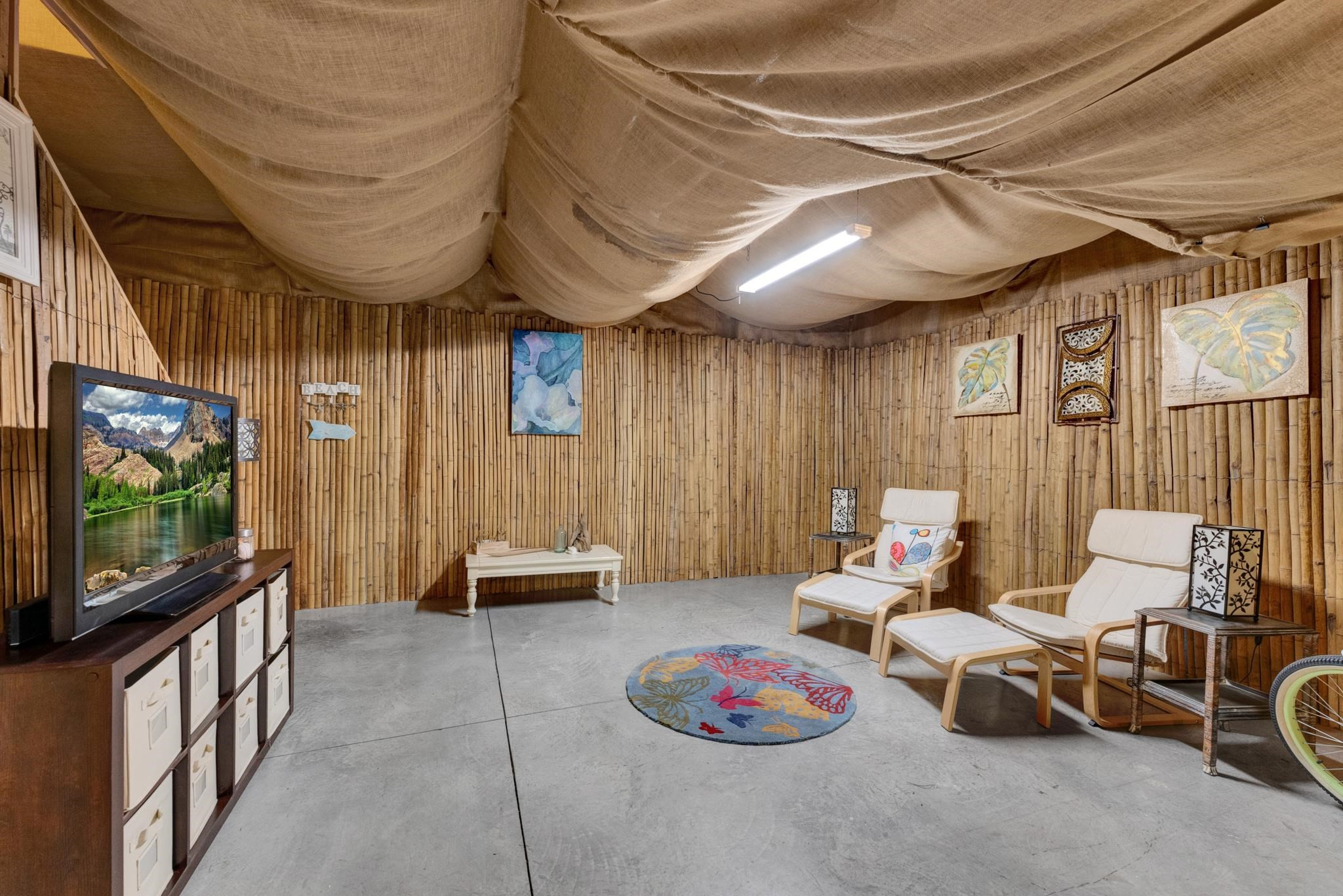 118 Citation Circle Durham, NC 27704 - Photo 39 of 67 a living room with furniture and a flat screen tv
