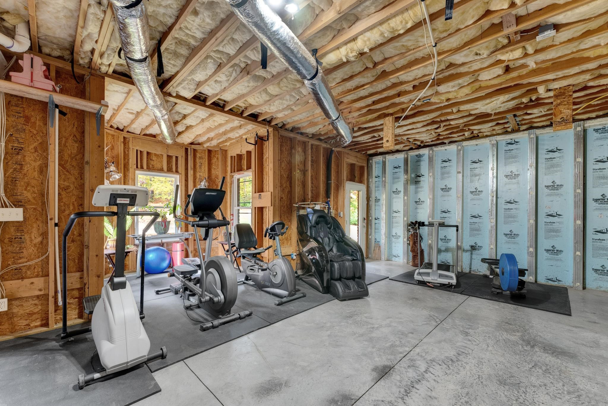 118 Citation Circle Durham, NC 27704 - Photo 41 of 67 a view of a room with gym equipment
