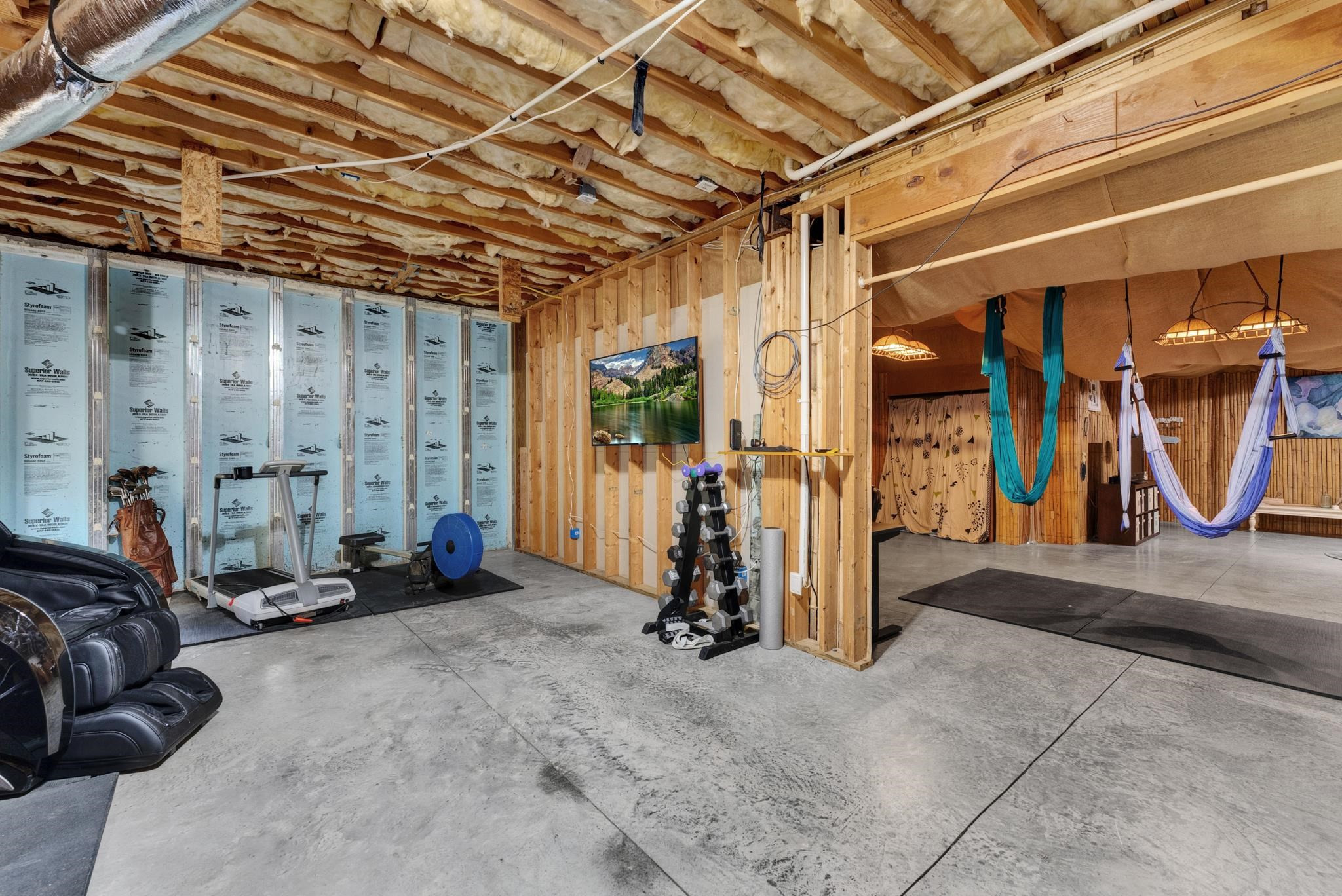 118 Citation Circle Durham, NC 27704 - Photo 42 of 67 a view of a room with gym equipment