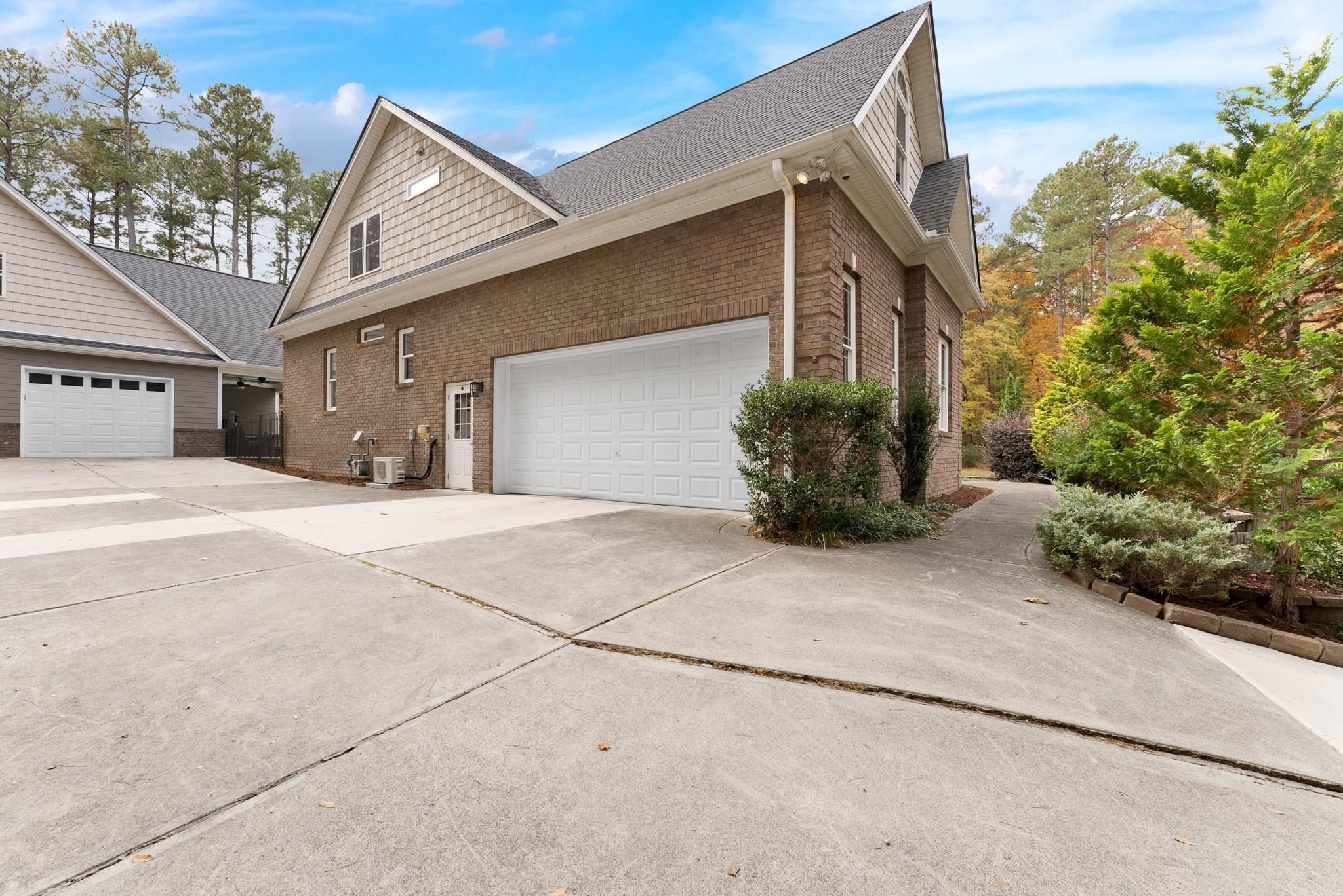 118 Citation Circle Durham, NC 27704 - Photo 56 of 67 a front view of a house with garden