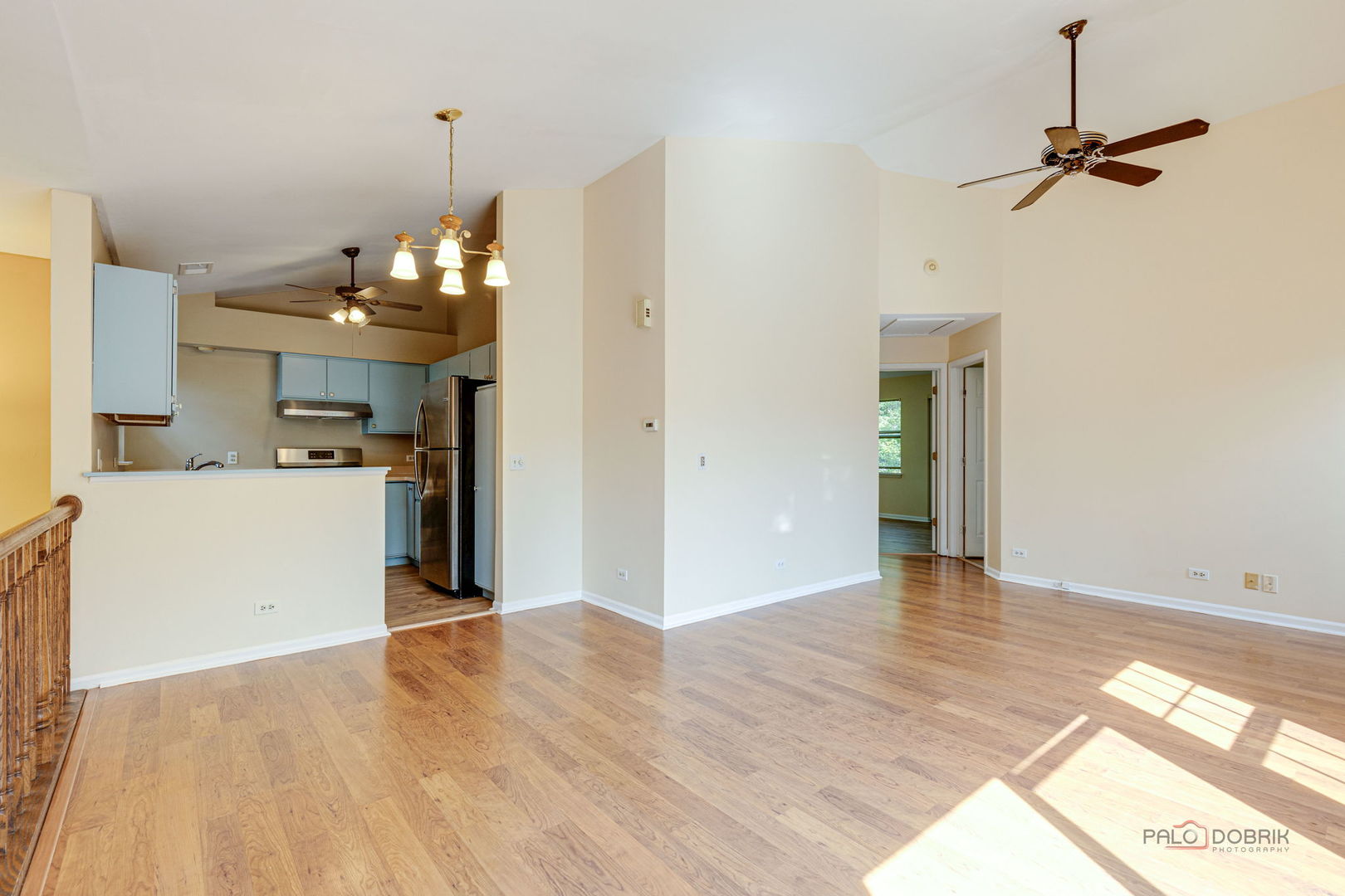 925 Ridgefield Lane Wheeling, IL 60090 - Photo 8 of 25 a view of a kitchen with a sink cabinets and wooden floor