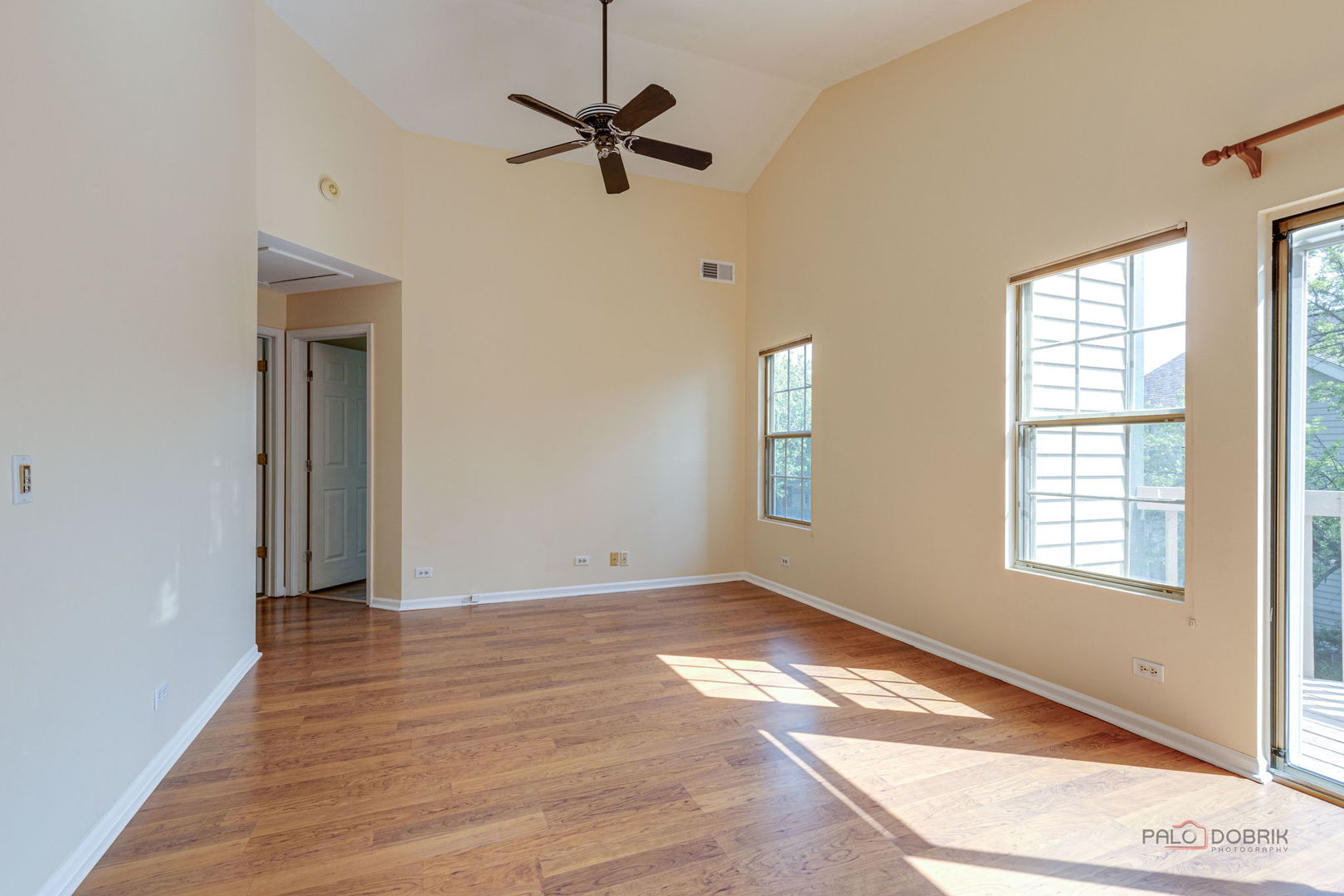 925 Ridgefield Lane Wheeling, IL 60090 - Photo 9 of 25 a view of empty room with wooden floor and fan