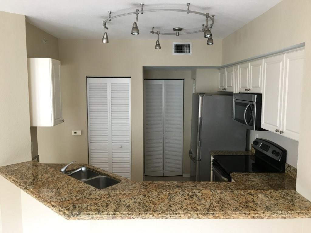 6384 West Sample Road, Unit 6384 Coral Springs, FL 33067 - Photo 5 of 21 Kitchen