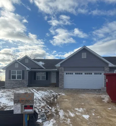 front view of a house with a dry yard