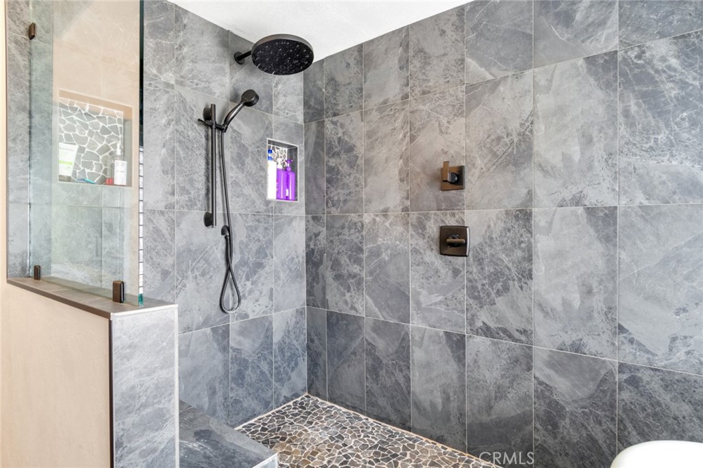 20970 Rider Street Perris, CA 92570 - Photo 15 of 29 a bathroom with a shower