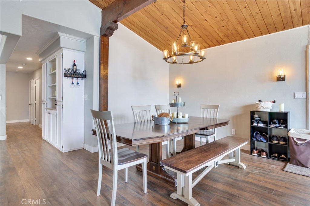 20970 Rider Street Perris, CA 92570 - Photo 10 of 29 a view of a dining room with furniture and wooden floor