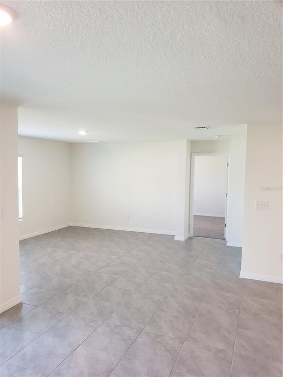12211 Kingsley Trail Parrish, FL 34219 - Photo 18 of 28 a view of an empty room