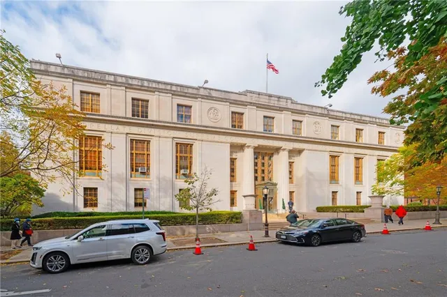 a car parked in front of a building