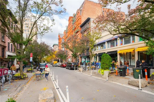 a view of street with cars
