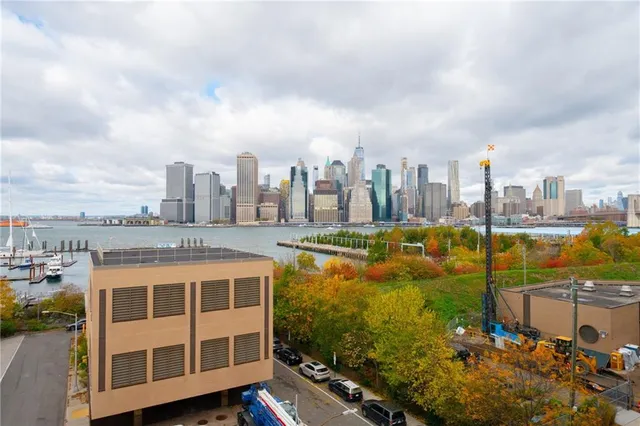 a view of a city with tall buildings