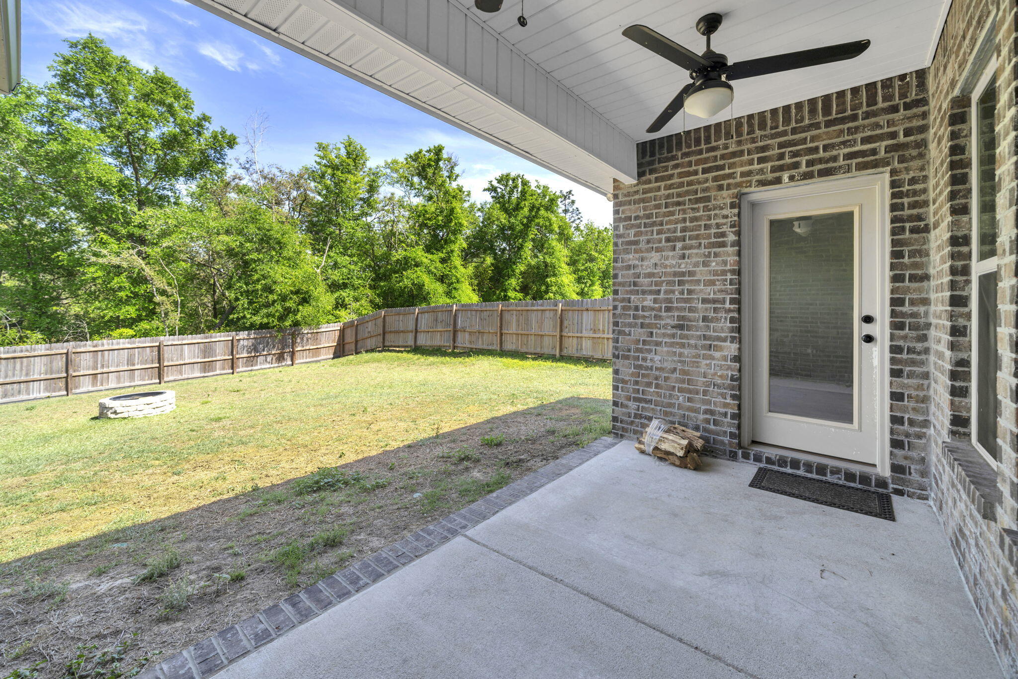 4603 Jayhawk Drive Crestview, FL 32539 - Photo 38 of 41 a view of a backyard with a swimming pool