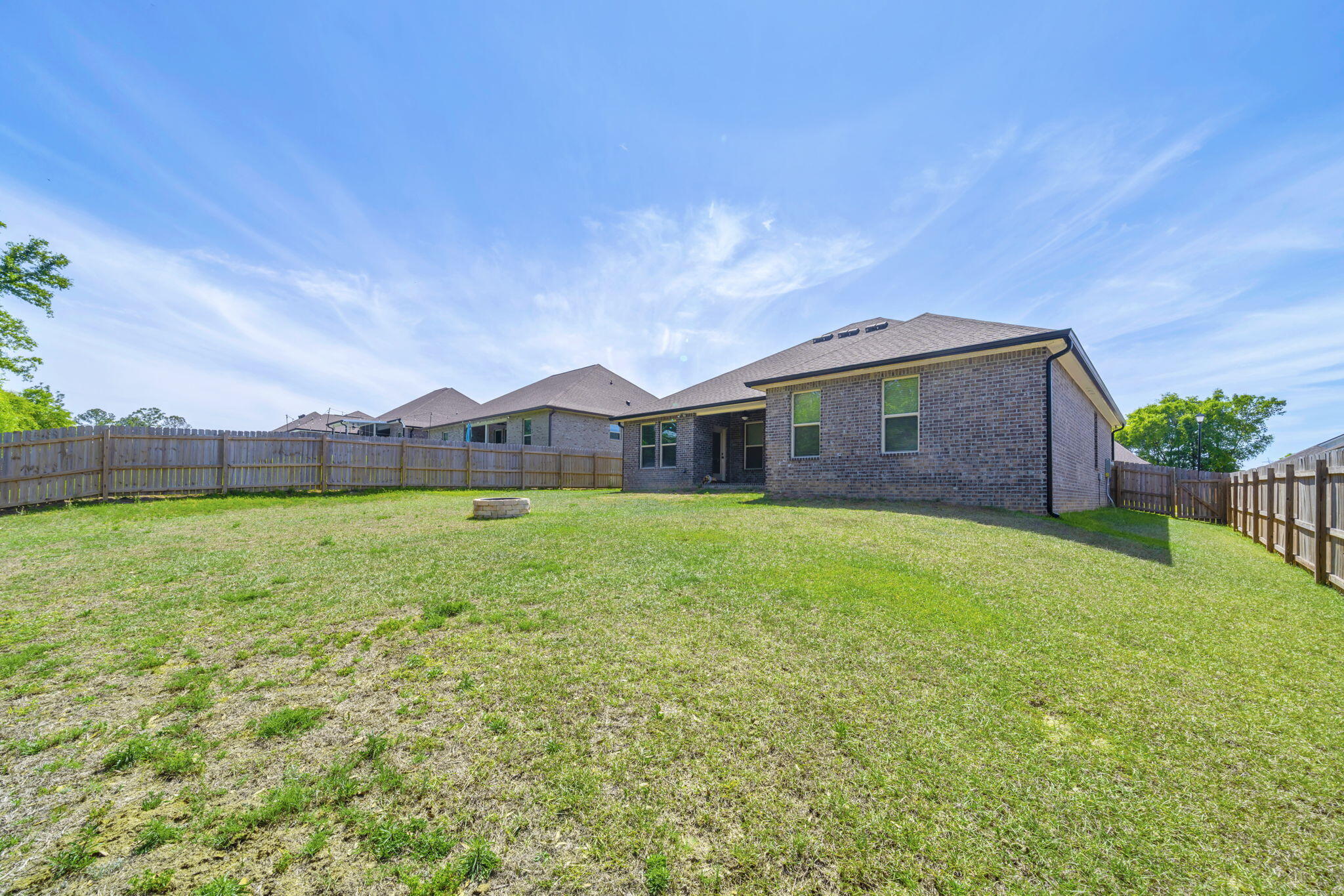 4603 Jayhawk Drive Crestview, FL 32539 - Photo 41 of 41 a front view of house with yard and outdoor seating