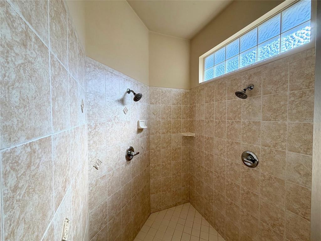 6508 Northwest 109th Place Alachua, FL 32615 - Photo 13 of 24 a bathroom with a shower