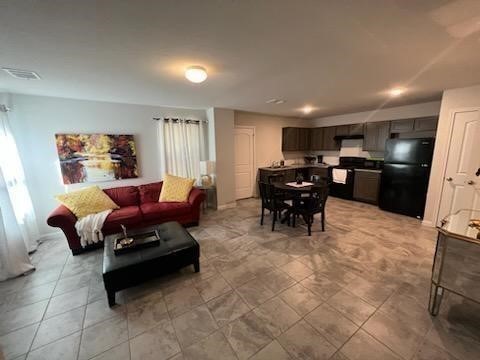 28616 Netawaka Point Blank, TX 77364 - Photo 2 of 9 a living room with furniture and kitchen view