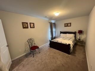 28616 Netawaka Point Blank, TX 77364 - Photo 5 of 9 a bedroom with a bed and a chair