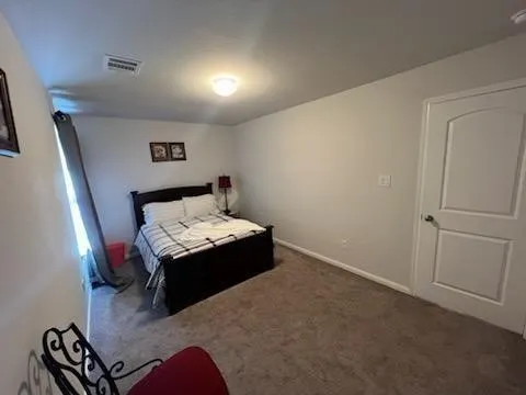 a bathroom with a sink a toilet a tub and a mirror