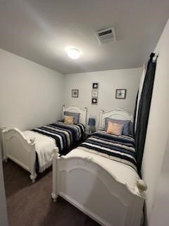 28616 Netawaka Point Blank, TX 77364 - Photo 9 of 9 a bedroom with two beds and a large mirror