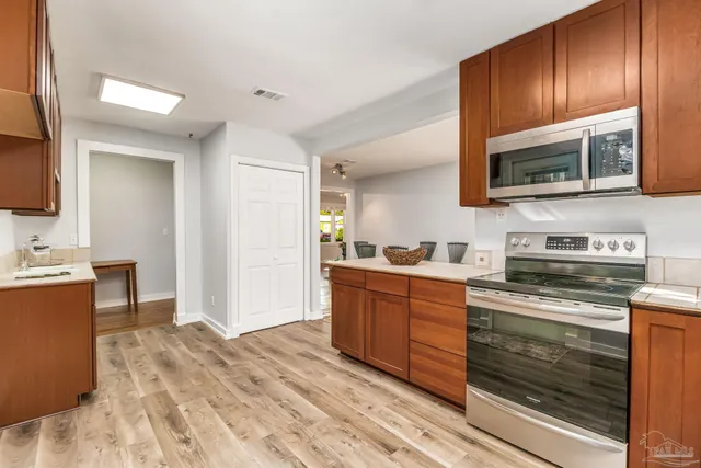 a view of a room with shelf on the wall