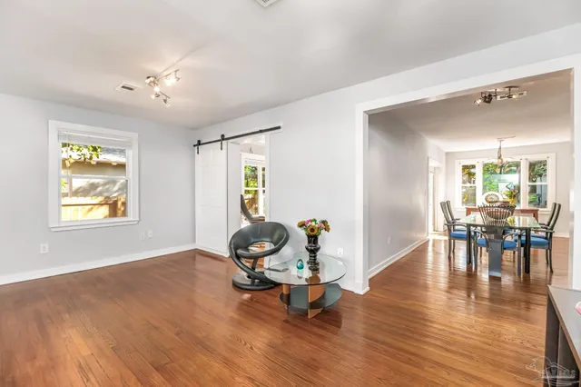 a living room with furniture and a window