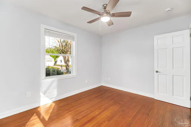 a bathroom with a sink a mirror and a shower