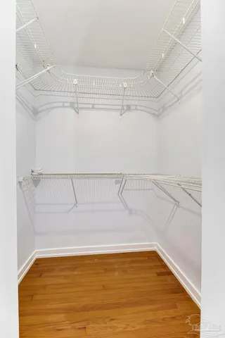 a bath room with a bath tub and a shower