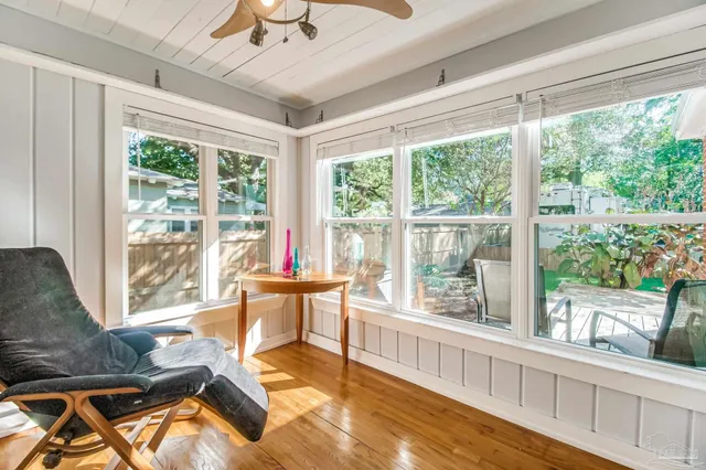 a living room with furniture and a window