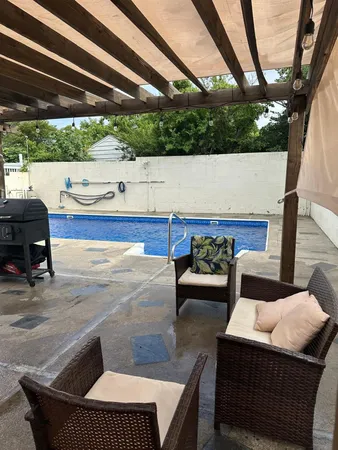 a view of outdoor space with seating