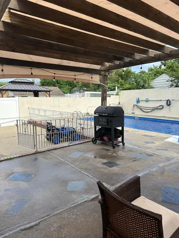 a room with furniture and flat screen tv