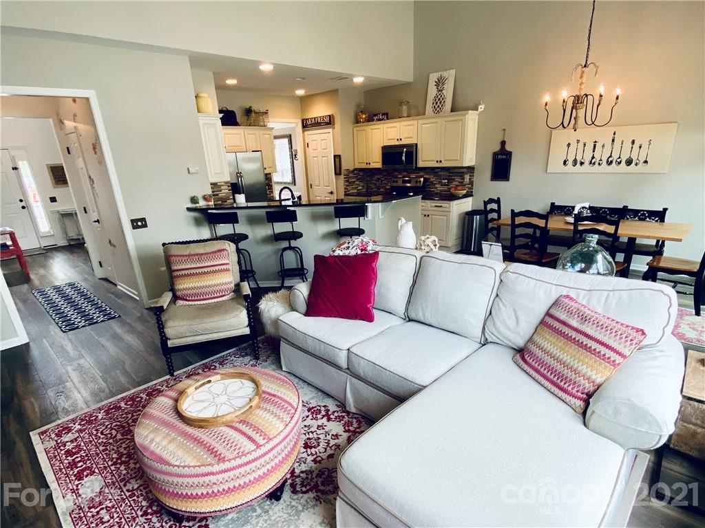2605 Stirrup Ridge Lane Charlotte, NC 28270 - Photo 13 of 27 a living room with furniture and wooden floor