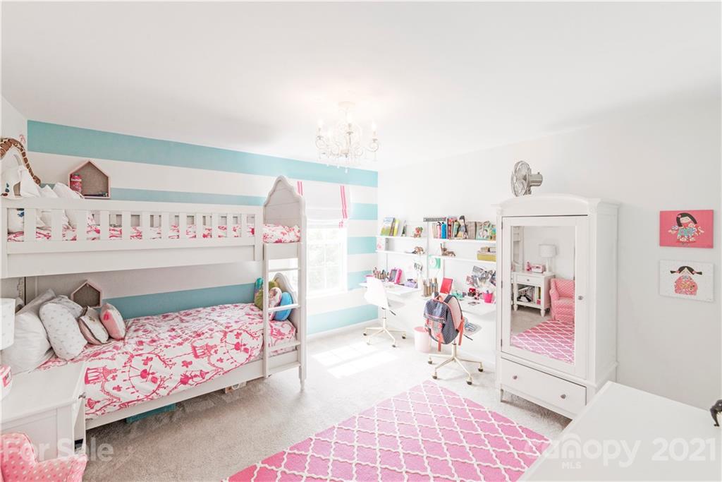 2605 Stirrup Ridge Lane Charlotte, NC 28270 - Photo 24 of 27 a bed room with a bed and a desk