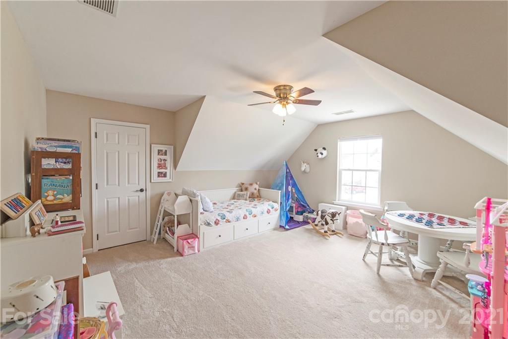 2605 Stirrup Ridge Lane Charlotte, NC 28270 - Photo 25 of 27 a bedroom with a bed and a window