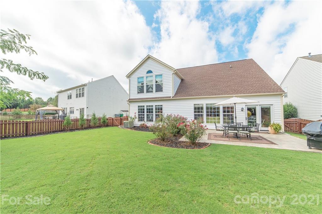 2605 Stirrup Ridge Lane Charlotte, NC 28270 - Photo 27 of 27 a front view of house with yard and outdoor seating