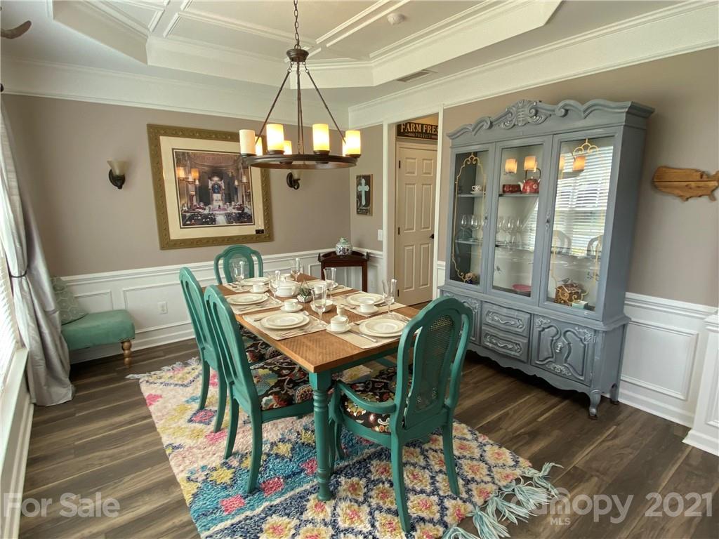 2605 Stirrup Ridge Lane Charlotte, NC 28270 - Photo 5 of 27 a view of a dining room with furniture window and wooden floor