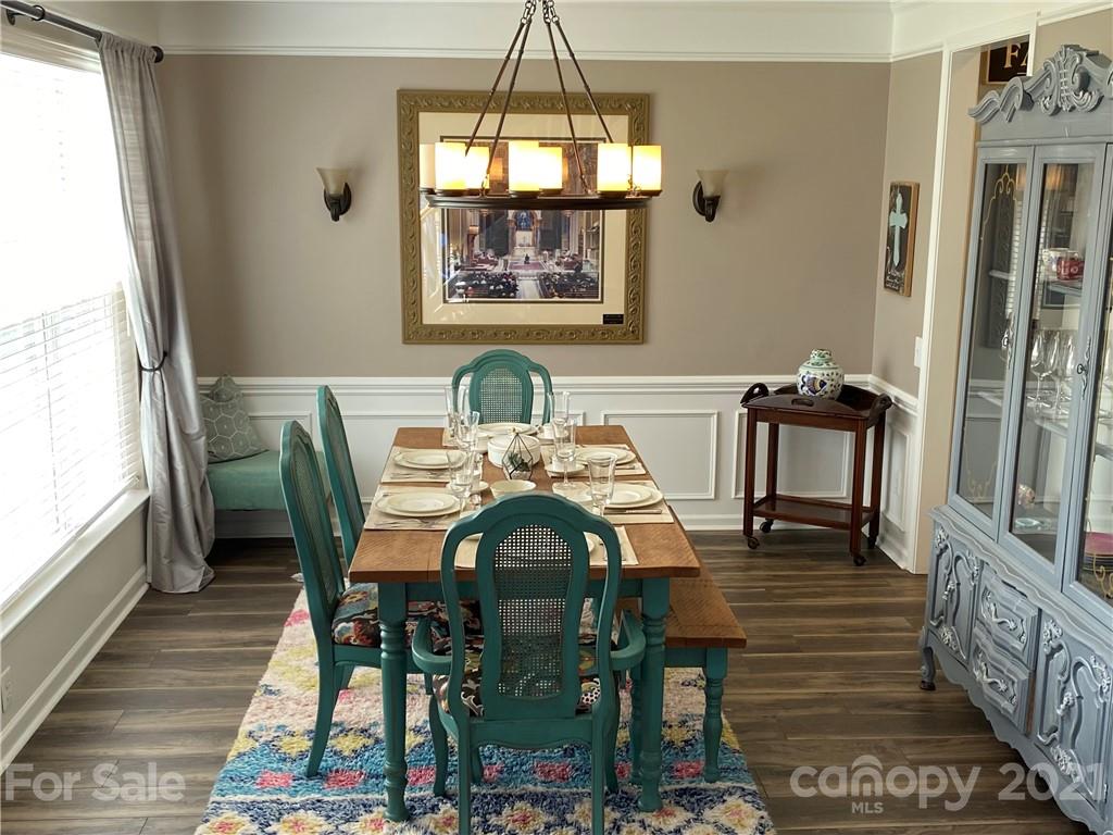 2605 Stirrup Ridge Lane Charlotte, NC 28270 - Photo 6 of 27 a view of a dining room with furniture window and wooden floor
