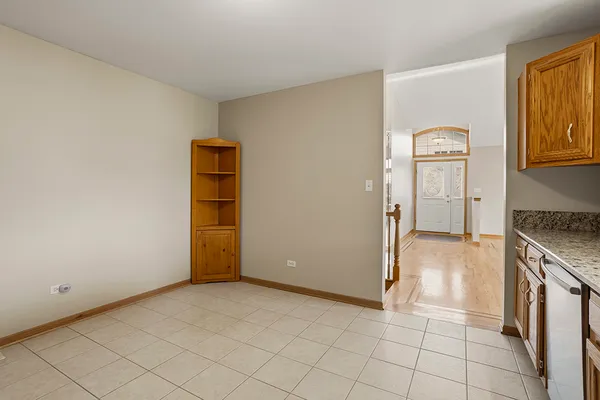 a view of a kitchen cabinets and wooden floor