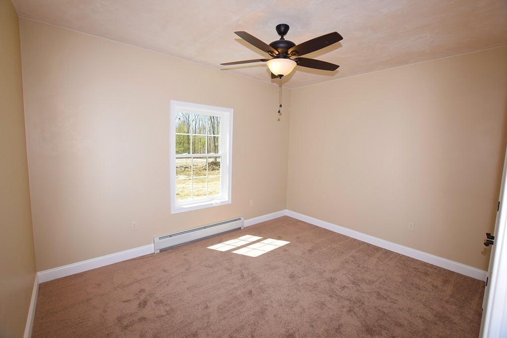 70 New Salem Road Petersham, MA 01366 - Photo 15 of 22 an empty room with a window