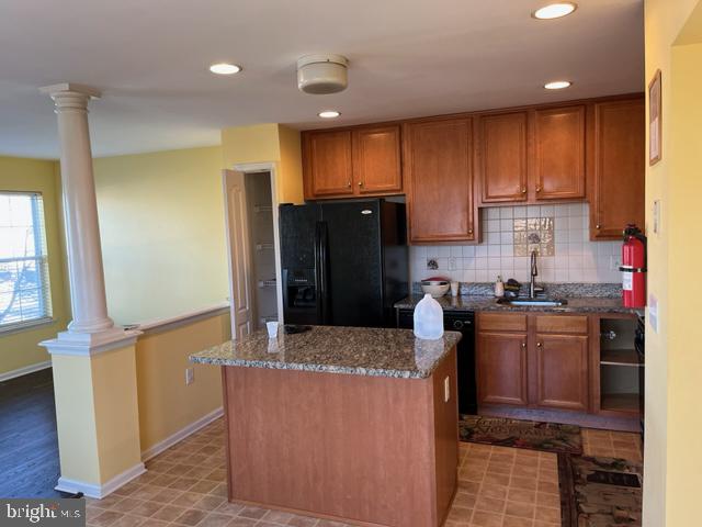 1032 Moore Road Thorofare, NJ 08086 - Photo 17 of 31 a kitchen with stainless steel appliances kitchen island granite countertop a refrigerator and a stove top oven