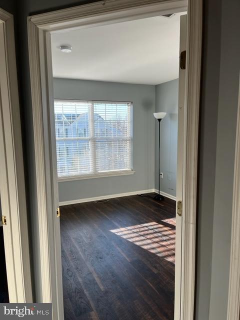1032 Moore Road Thorofare, NJ 08086 - Photo 20 of 31 a view of an empty room with wooden floor and a window