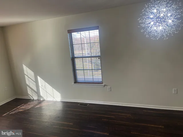 a view of a hallway view with walk in closet