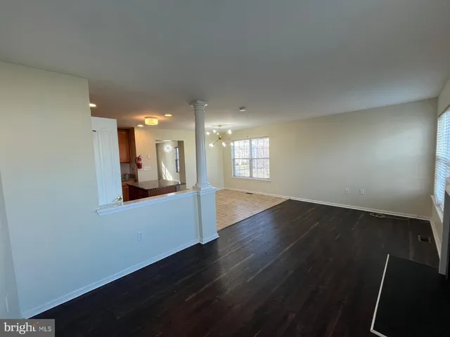 a view of a hallway with staircase