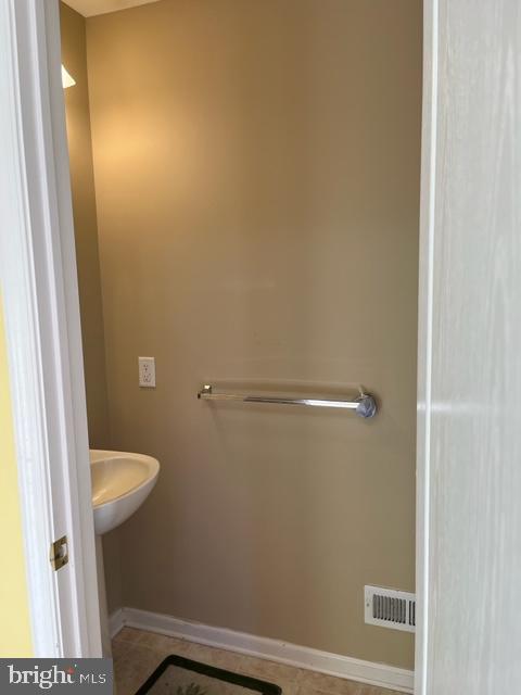 1032 Moore Road Thorofare, NJ 08086 - Photo 3 of 31 a bathroom with a sink