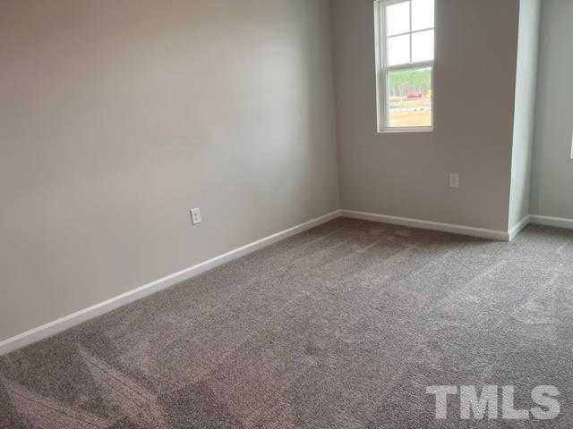 2403 Chert Lane, Unit 2403 Raleigh, NC 27610 - Photo 10 of 19 an empty room with a window