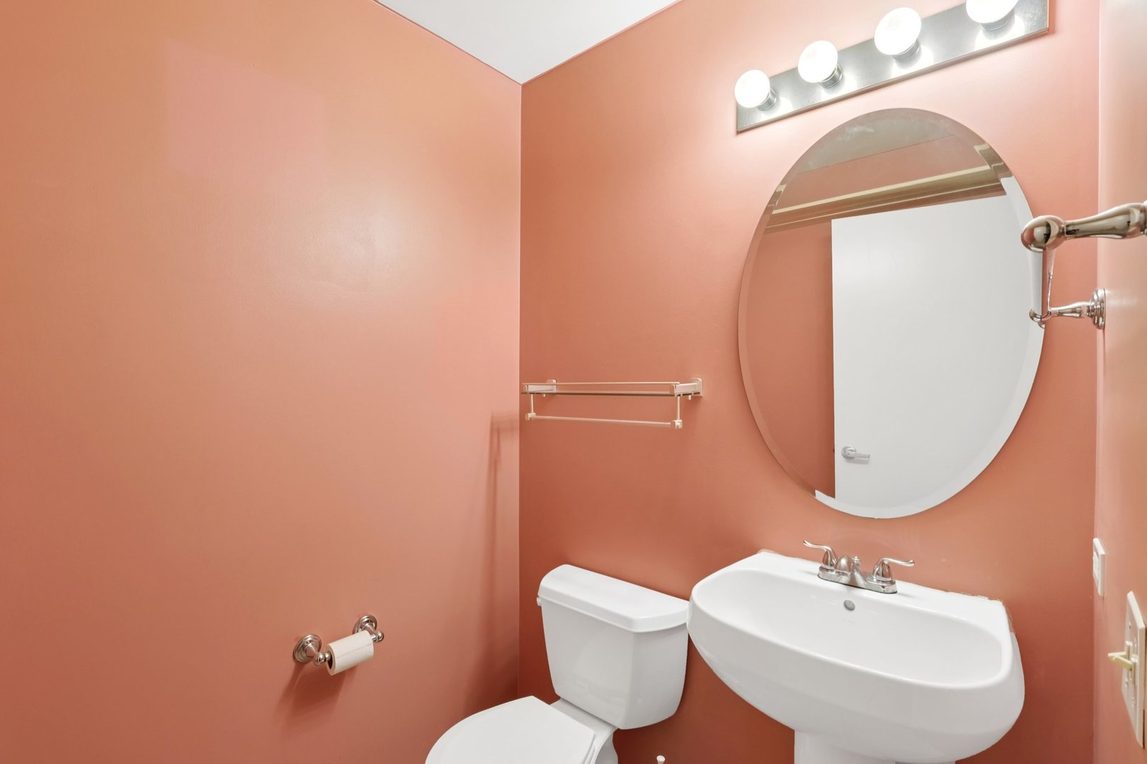 974 West 35th Place, Unit 302 Chicago, IL 60609 - Photo 16 of 22 a bathroom with a toilet mirror and sink