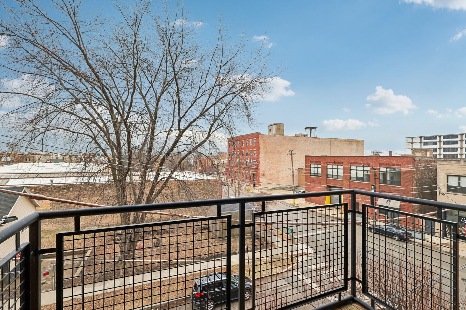 974 West 35th Place, Unit 302 Chicago, IL 60609 - Photo 21 of 22 a view of city from balcony