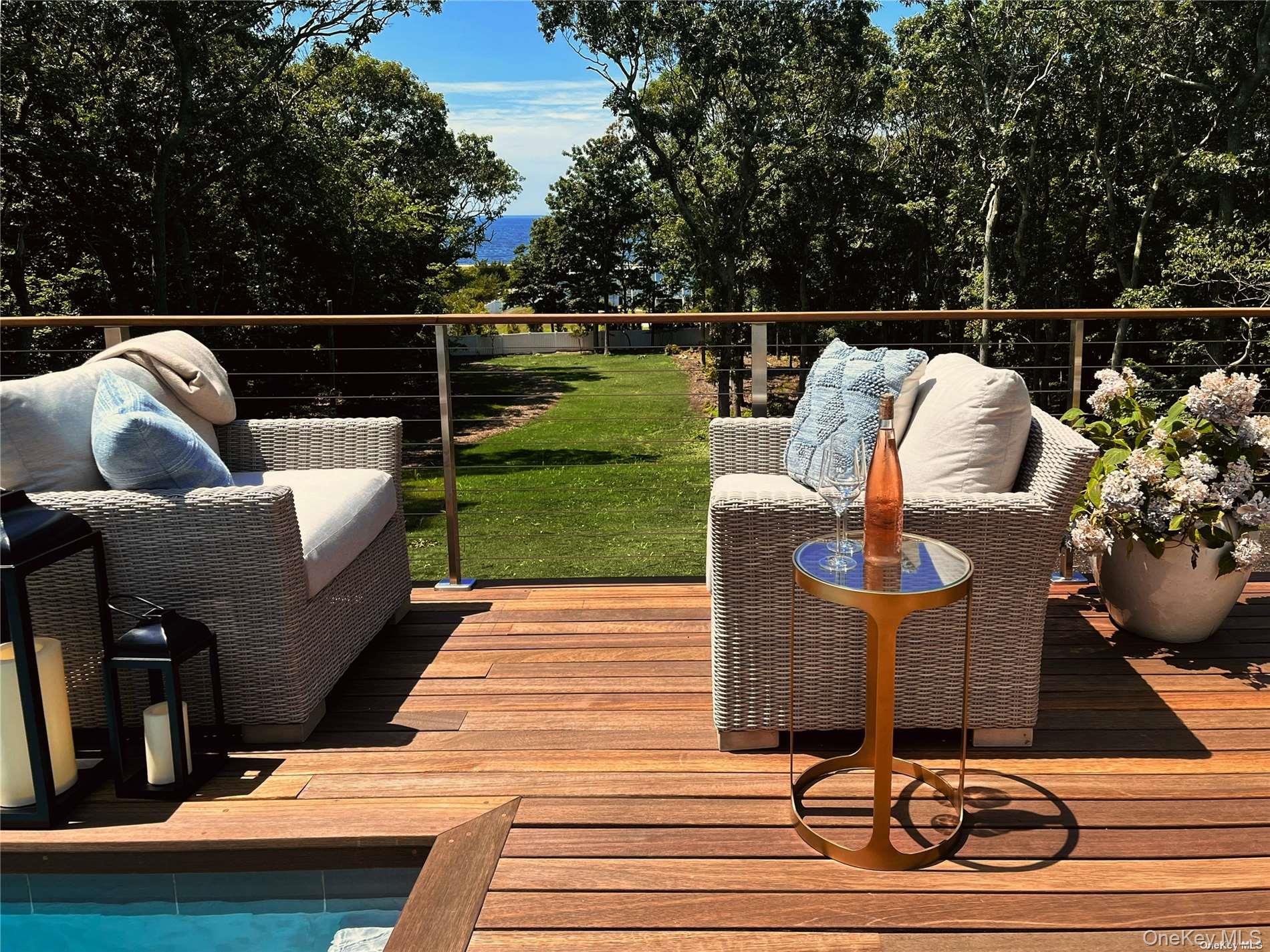 11925 Soundview Avenue Southold, NY 11971 - Photo 4 of 15 Pool deck with water views