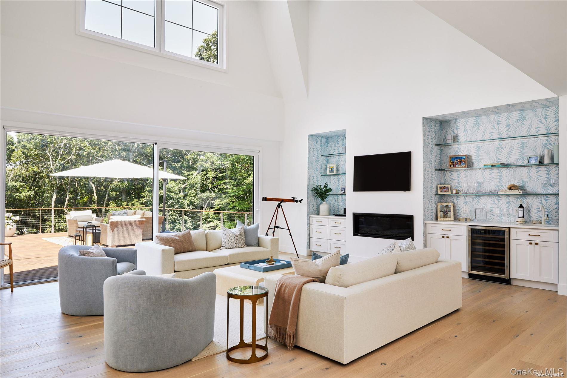 11925 Soundview Avenue Southold, NY 11971 - Photo 7 of 15 Living area with cathedral ceilings